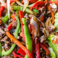 Fajitas Platos · Your choice of filling, grilled onions, red and green bell peppers served over Mexican rice,...