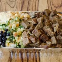 Lamb over Rice · A delicious meal of ground lamb mixed with a selection of the finest herbs and spices, cooke...