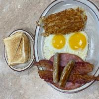 Country-Style Breakfast · 2 eggs, hash browns, bacon, ham and sausage links - for the hearty appetite.