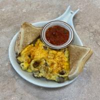 Salsa Skillet · Scrambled eggs with our southwest seasoned sausage over hash browns. Topped with melted chee...
