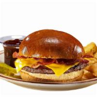 The Pub Burger · 1/3 pound. Loaded with cheese, crispy bacon, and tangy BBQ sauce. Served on a butter bun and...