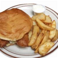 Fish Filet Sandwich · Light and flaky fish fillets served with lettuce and creamy tartar sauce. Served on a butter...