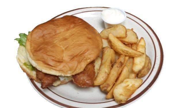Fish Filet Sandwich · Light and flaky fish fillets served with lettuce and creamy tartar sauce. Served on a butter bun and includes a stack of skin-on potato wedges.