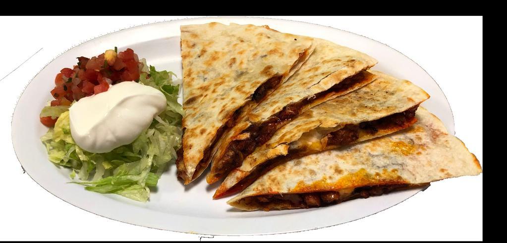 Al Pastor Quesadilla · Served with cheese and sour cream, lettuce, and pico de gallo on the side.