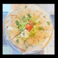 Pizza Quesadilla · Choice of 2 Meats Served with beans, cheese, and pico de gallo on the inside with sour cream...