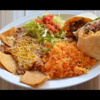 Burrito Combo · Regular burrito of your choice of meat ,serve with rice, refried beans garnished with cheese...