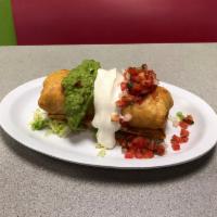 Chimichanga · Choice of meat,rice,beans,cheese topped with sour cream, cheese,guacamole,pico de gallo.