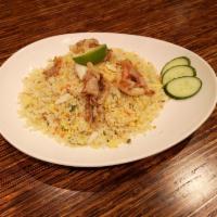 Signature Soft-Shell Crab Fried Rice · Crispy soft-shell crab meat, egg, and onions
