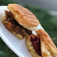 Tapa Sandwich · Tapa (pork cured in lemon juice, soy and garlic) served with Valerio's egg pandesal, fried e...