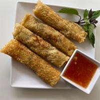 A1. Eggrolls · Cha gio. 4 pieces. Crispy rolls filled with pork and vegetables served with chili lime fish ...