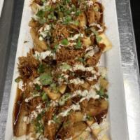 BBQ Buffalo Chicken Yucca Fries · Bbq buffalo chicken with blue cheese topped with cilantro & scallions