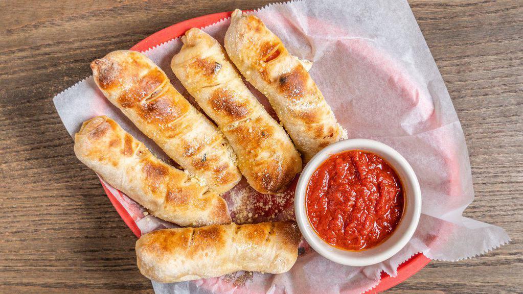 Luke's Pepperoni Rolls - Appetizer · Stuffed with cheese and pepperoni, served with a side of red sauce.