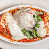 Italian Meatballs · Homemade Italian meatballs oven baked, covered with our red sauce and mozzarella cheese.