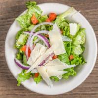 Julians House Salad · Mixed greens with diced tomatoes, red onions and shaved Parmesan cheese. Italian or ranch dr...