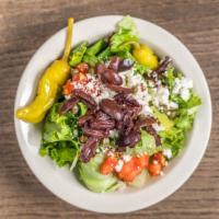 Greek Salad · Leafy greens, diced tomatoes, feta cheese, Kalamata olives, pepperoncini pepper, bacon bits ...