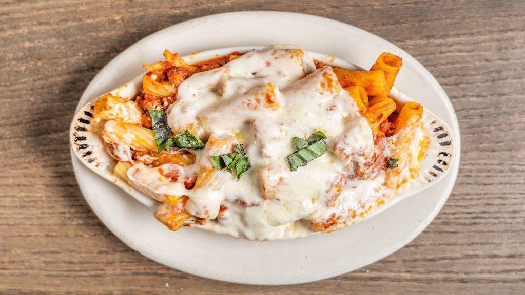 Rylee's Baked Rigatoni with Meat Sauce · Rigatoni pasta with meat sauce, mozzarella cheese and oven baked. Served with small house salad.