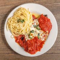 Hank's Chicken Parmigiana · Boneless chicken breast breaded and fried, topped with marinara sauce, oven baked with mozza...