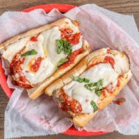 Meatball Bomber Sub · Homemade meatballs and mozzarella cheese with red sauce. Oven toasted. Served on 12
