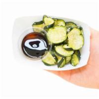 Sweet and Sour Pickles · House pickled cucumbers, sesame seeds