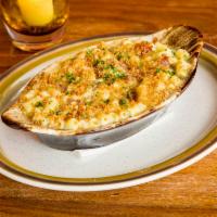 Wine Lover's Mac and Cheese · Artisan welsh cheddar and Parmigiano-Reggiano with smoked bacon, scallions and toasted bread...