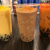 Thai Ice Tea · The Thai Tea drink is the one all the way on the right. It is a beautiful orange color and m...