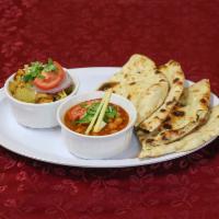 2 Item Veggie Combo · You can choose any two vegetarian items (8oz each) With this you can have 2 regular roti or ...