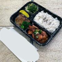 Chicken Teriyaki Bento Box · Chicken Teriyaki served with a side of beef sukiyayki, seaweed salad, radish, and steamed rice