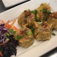 Chicken and Shrimp Dumplings · Choice of steamed or fried and served with sweet soy vinaigrette.