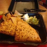 Classic Quesadilla · Large grilled flour tortilla filled with jack and cheddar cheeses. Served with salsa, fresh ...