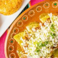 Enchiladas en Salsa Verde · Carnitas, al pastor, bistec, pollo. Corn tortilla rolled around a filling and covered with a...