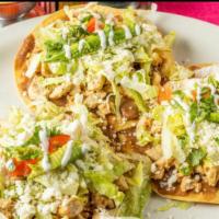 Tostadas de Pollo · Chicken. 3 pieces. Chicken served with beans, lettuce, cheese, cream, and avocado.
