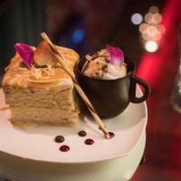 Tres Leche Dessert Duo · Chef’s special slice of dulce de leche 3 milk cake topped with caramel whipped cream, brown ...