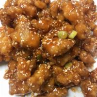 51. Sesame Chicken · Tender crispy chicken glazed with a sweet sesame sauce. Served with choice of side.