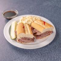 Beef Dip Sandwich · Brisket or Roast Beef cooked in our kitchen on a French roll with Au Jus. 