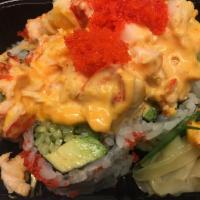 Maine Lobster Maki · Fresh lobster baked with with spicy mayo over California Maki with masago on top.