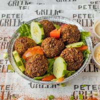Falafel · 6 pieces served with pita hummus and tahini