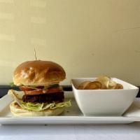 Mexi-Shrimp Burger · crispy fried shrimp, toasted bun, chipotle mayo, pickled jalapeños, lettuce, tomato, red oni...