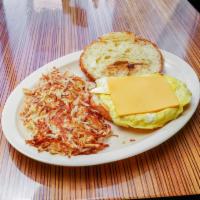 Egg & Cheese Croissant Breakfast · Served on a flaky French pastry.