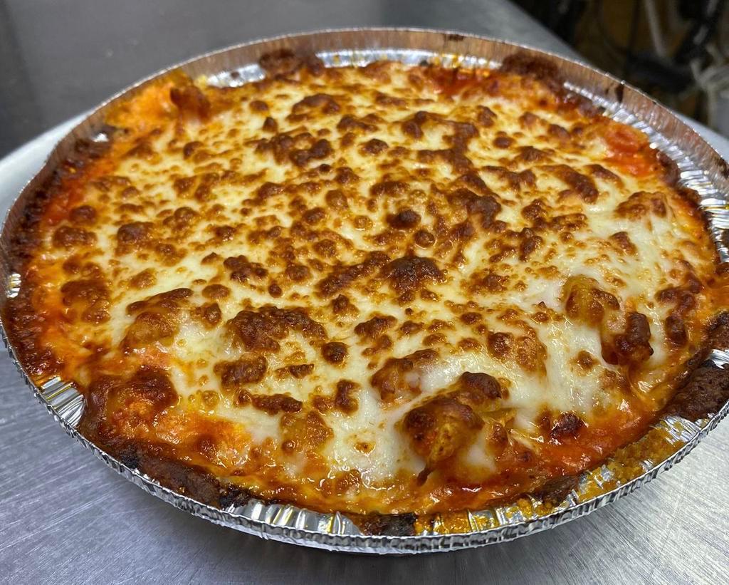 Baked Ziti · Penne pasta baked with our ziti sauce, ricotta and Parmesan cheese and topped with mozzarella.