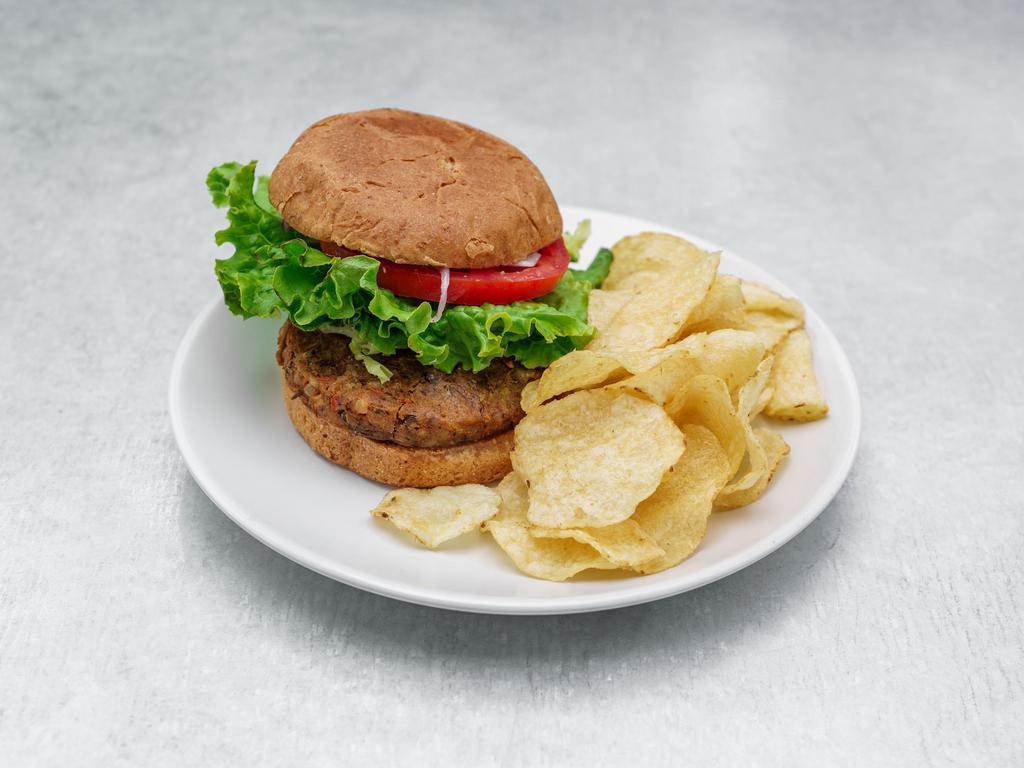 Amazing Burger · Our house-made patty, sunflower sprouts, lettuce, tomato, onion, and vegenaise on a whole wheat bun. Served with chips.