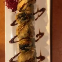 J.B. Tempura Roll · Deep-fried salmon, cream cheese, scallions drizzled with eel sauce