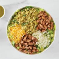 Grilled Angus Steak Bowl · Grilled angus steak on a bed of chopped romaine, pinto beans, cilantro-lime rice, cheese, on...