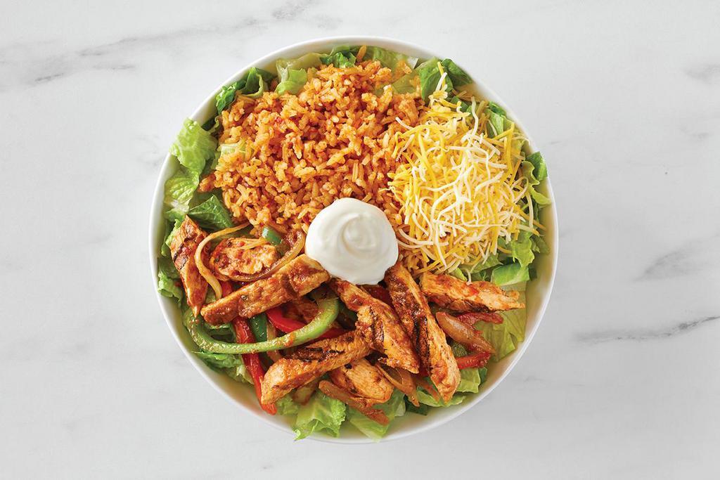 Fajita Burrito Bowl · Choice of filling sautéed with red and green bell peppers, onions, garlic and mild salsa, Spanish rice, cheese, sour cream on a bed of chopped romaine