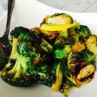 13. Fried Brussels Sprouts Salad · Deep-fried brussels sprouts, broccoli, roasted garlic. Topped with sea salt, pepper, lemon w...