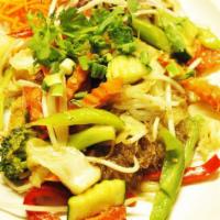 41. Phad Woon Sen · Bean thread noodles, fried tofu, tomatoes, mushrooms, celery, onions, carrots, broccolis, be...