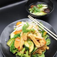 46. Rice Noodle with Tofu · Thin rice noodles, fried tofu, and seasonal vegetables. Cooked in Thai seasoning, garlic oil...