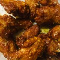Sauteed Chicken Wings · Sauteed in garlic and lemon juice. Choice of hot sauce, ranch, H.P Sauce or BBQ Sauce.
