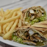 Chicken Shawarma Wrap · Sliced chicken served in Lebanese bread with lettuce, pickles, onions, and garlic sauce.