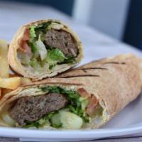 Lamb & Beef Kofta Wrap · Lamb & Beef Kofta skewer served in Lebanese bread with lettuce, tomatoes, pickles, onions, a...