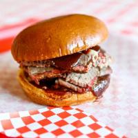 BBQ Sandwich · Slow Smoked Texas Brisket Sliced Or Chopped Served On A Toasted Brioche Bun
